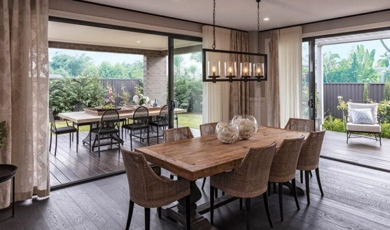 image of indoor and outdoor living areas featuring dark engineered timber flooring vs hybrid